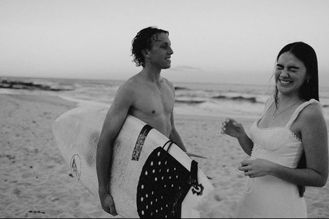 couple on Sunshine Coast beach for engagement shoot