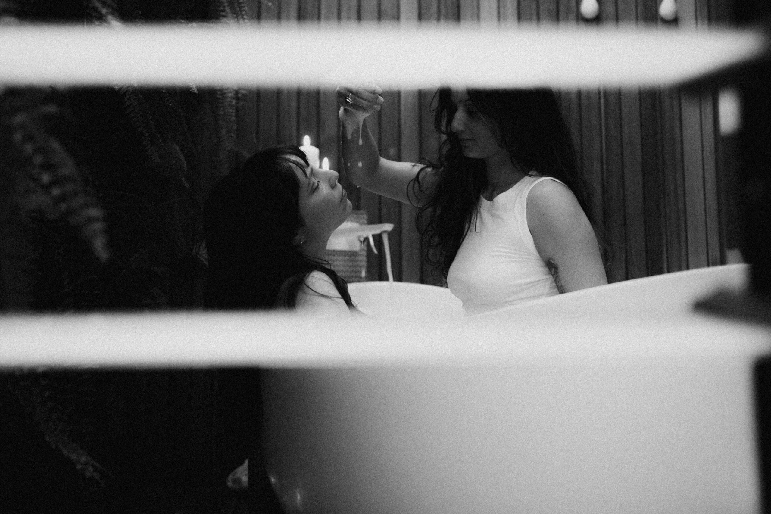 two women in a bath for a photography workshop